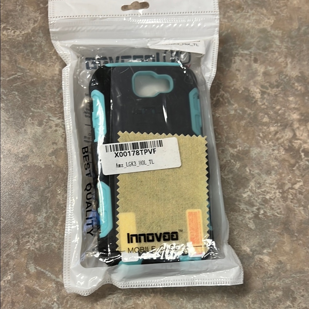 Black and Teal Phone Case.   It is for an older phone an LG style.